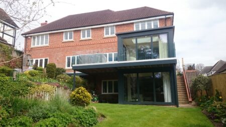 Two storey extension to detached home on sloping site